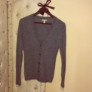 Grey cardigan.